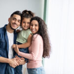 Portraif,Of,Happy,Arabic,Parents,Posing,With,Their,Little,Daughter