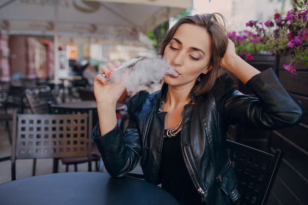 adult-touching-her-head-while-smoking_1157-448