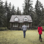 couple-heading-forest-shack