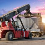 crane-loading-cargo-container-dock_1048944-29927680