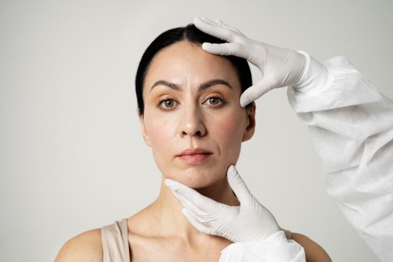 front-view-hands-holding-woman-s-head_23-2149349929