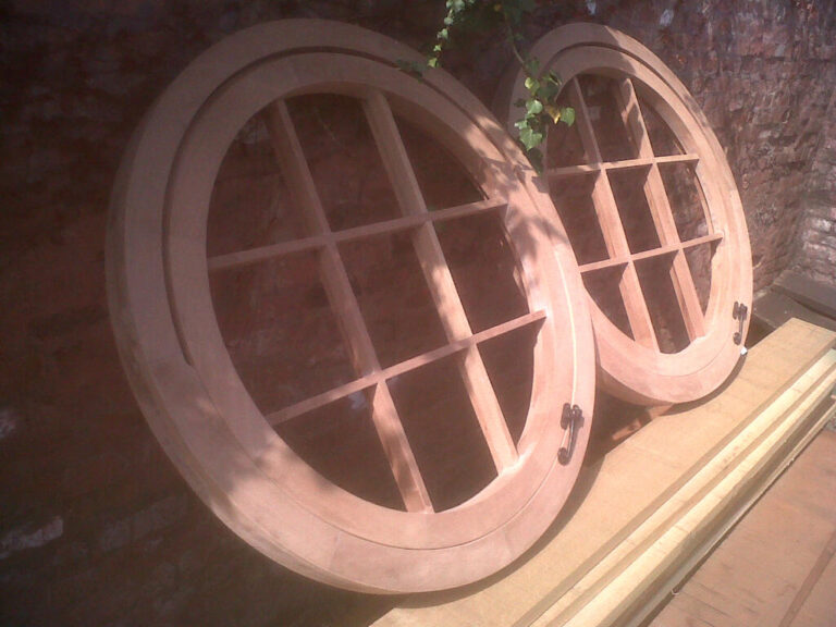 round timber window