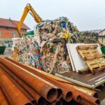 stack-garbage-metal-structure-against-sky_1048944-11059245