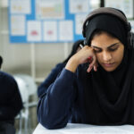 Muslim children studying in classroom