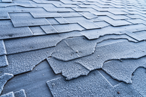 Close,Up,View,On,Asphalt,Roofing,Shingles,Roof,Damage,Covered