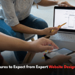 Web designer working on responsive site layout and UX.