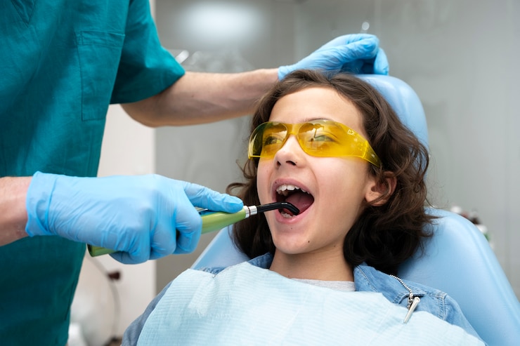 close-up-boy-dentist_23-2149206289