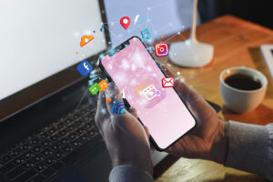 hands-holding-smartphone-social-media-concept-1-300x200.jpg