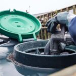 Heating oil delivery, nozzle placed into oil tank to refill