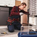 new-refrigerator-installation-senior-male-technician-checking-refrigerator-1024x684
