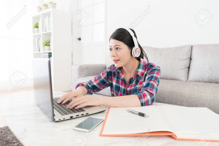 attractive sweet college student using computer