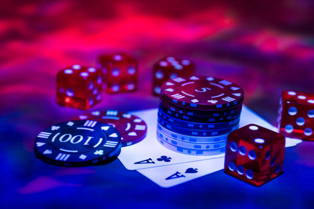 Casino abstract photo. Poker game on red background.  Theme of gambling.