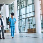 are-you-ready-this-procedure-shot-medical-practitioners-having-conversation-hospital_590464-8235