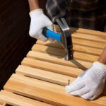 construction-worker-using-hammer-job-site (1)