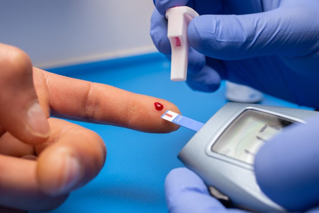 closeup-shot-doctor-with-rubber-gloves-taking-blood-test-from-patient-100kb