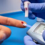 closeup-shot-doctor-with-rubber-gloves-taking-blood-test-from-patient-100kb
