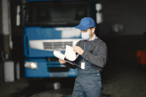 Worker checks product in  mask during coronavirus