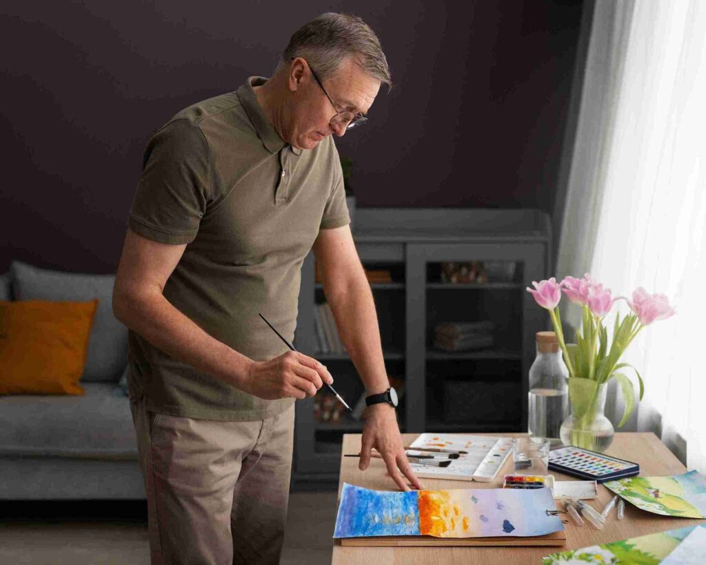 senior-artist-studio-painting-with-watercolor_11zon