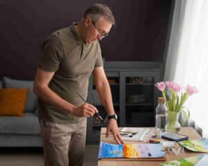 senior-artist-studio-painting-with-watercolor_11zon